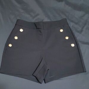 Elegant Black Women's Shorts with Gold Button Accents